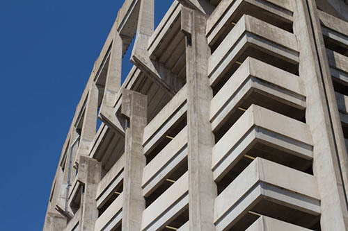 Concrete edifice of DKR against an azure sky