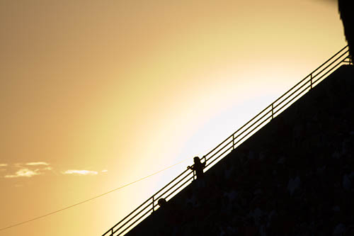 Sun setting behind the stands