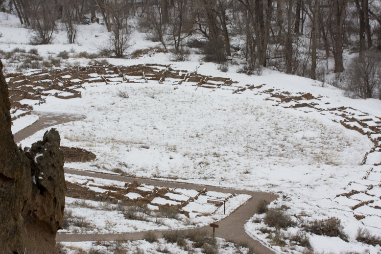 Ruined walls show where dwellings once formed a circle on the valley floor.